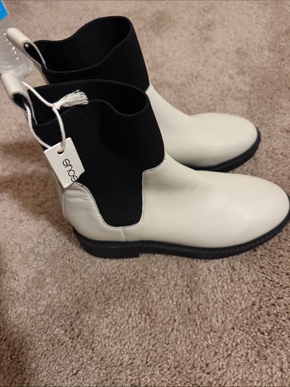 Andre Assous Two-Tone White and Black Chelsea Boots